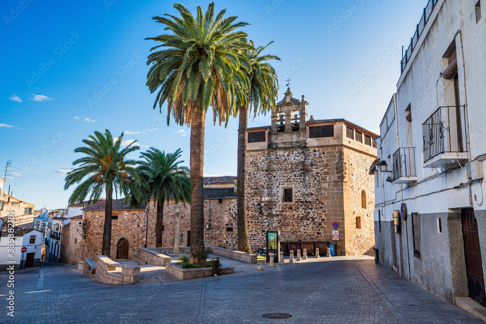 Narrow alley with old stone buildings at Caceres, Extremadura, Spain. Narrow alley with old stone buildings at Caceres, Extremadura, Spain.