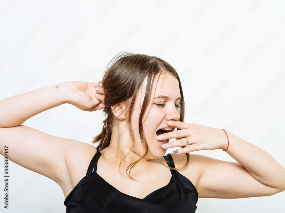 Yawns. Female
