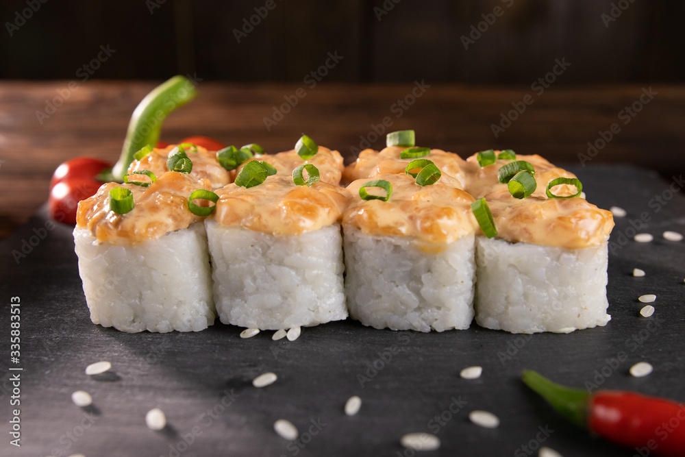 rolls with red pepper and leek on a stone board side view