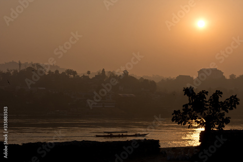 Boat Cruising While Sunrise on Mekong River  Chiang Khong  Thailand  Asia