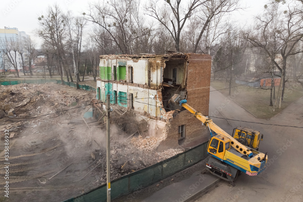 Destruction of a non-residential brick apartment building