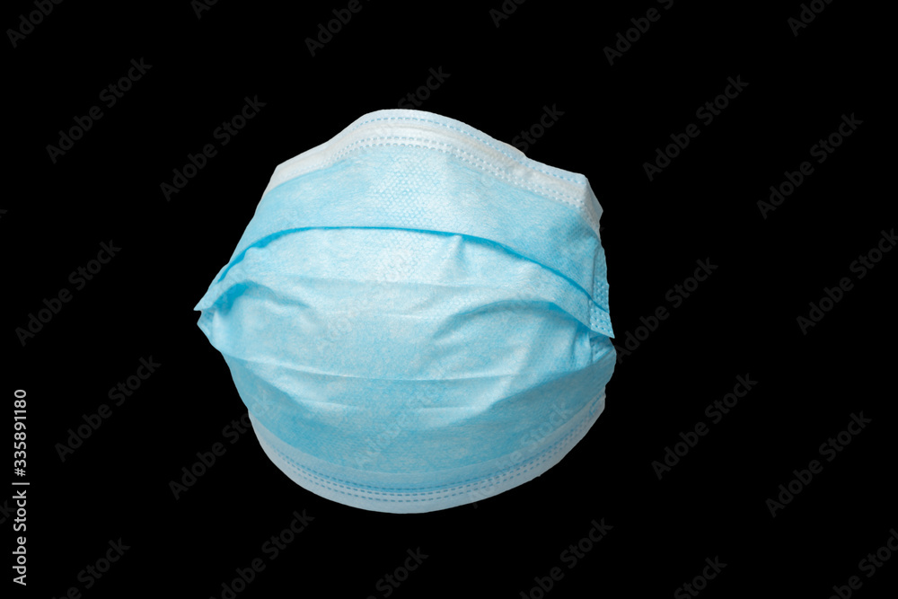 Obraz premium isolierte MNS-Maske, Mundschutz mit schwarzem Hintergrund