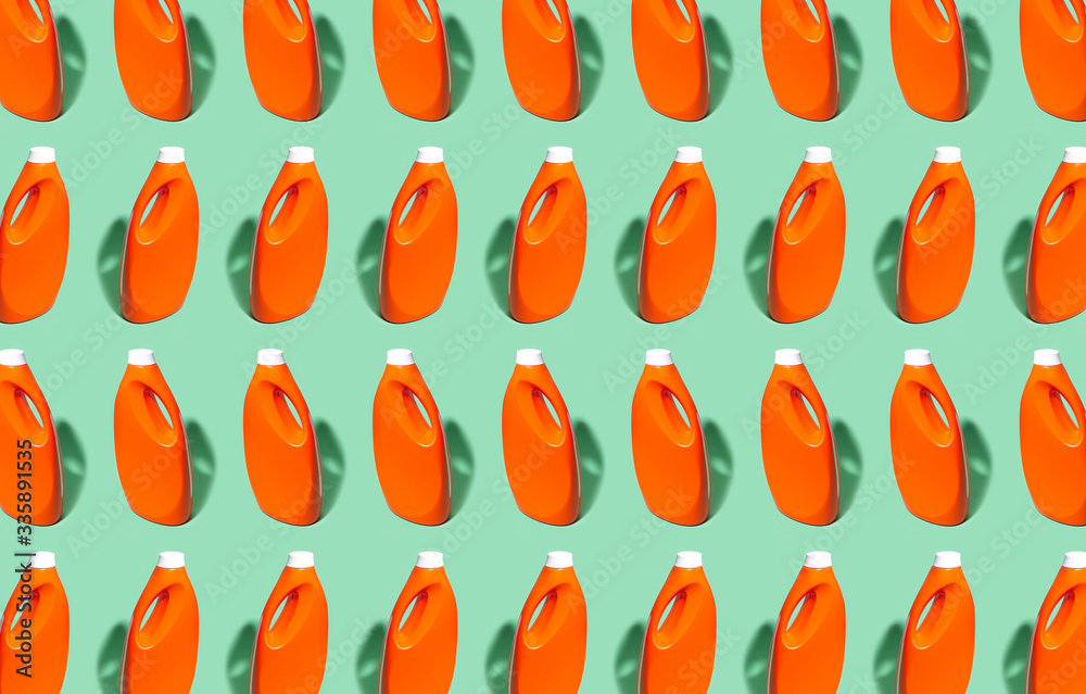 Pattern of lush lava color detergent bottles with mockup on background of aqua menthe color.