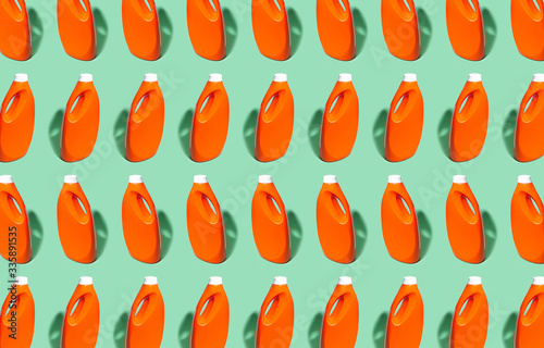 Pattern of lush lava color detergent bottles with mockup on background of aqua menthe color.
