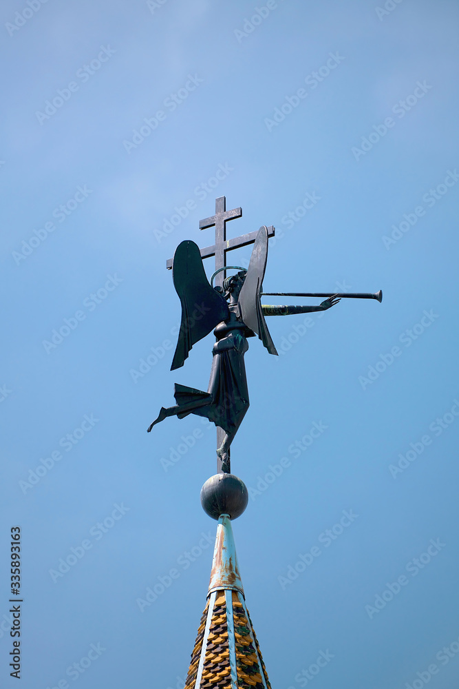 Russia, Kazan June 2019. Weather vane with an angel in the Raif monastery. Christian culture, tourism and pilgrimage. Russia, Kazan June 2019. Weather vane with an angel in the Raif monastery. Christian culture, tourism and pilgrimage.