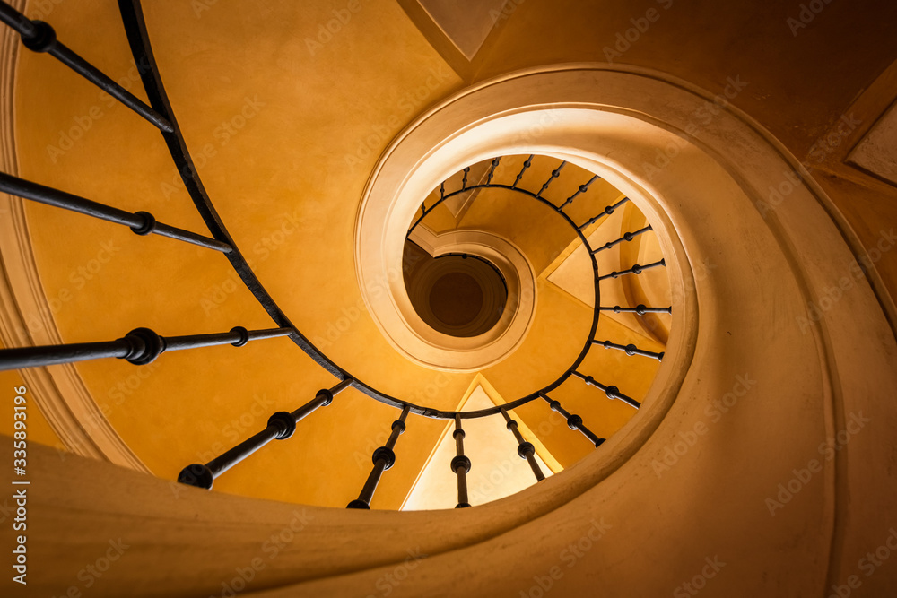 Fototapeta premium Yellow spiral staircase