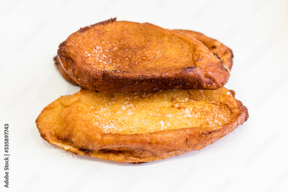 Torrijas, typical Spanish dessert based on milk bread and sugar Torrijas, typical Spanish dessert based on milk bread and sugar