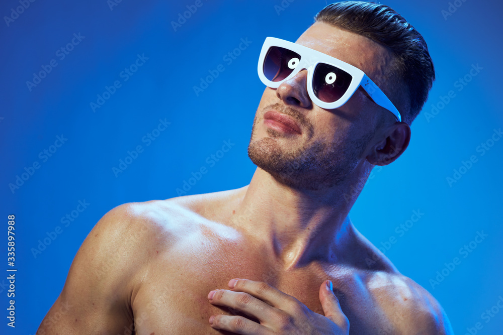 young man wearing sunglasses young man wearing sunglasses