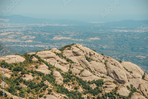 A mountain view with monastery on the top in Montserrat, Spain photo