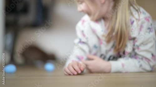girl playing with rabbit