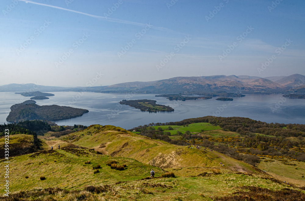 Fototapeta premium View from Conic hill in Scotland. Beautiful mountains with lake.