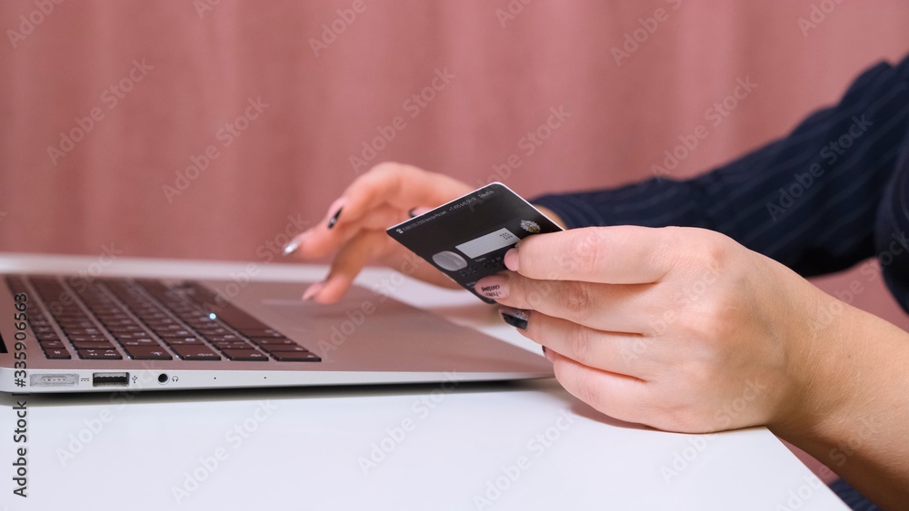 girl making online payment using laptop for shopping at home. girl making online payment using laptop for shopping at home.