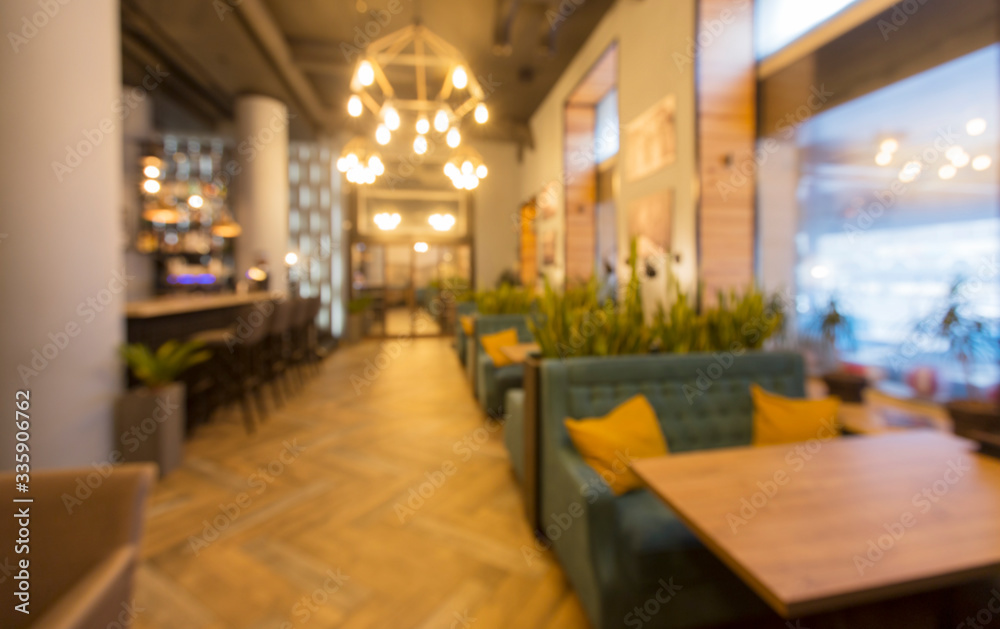 Blurred modern restaurant or cafe interior. Public place interior
