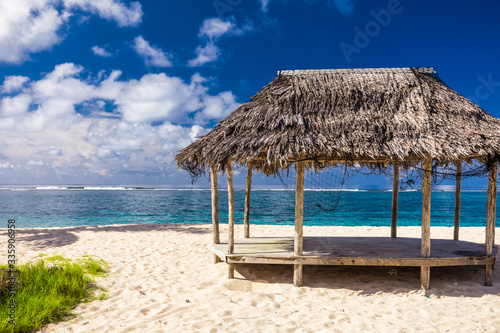 Lalomanu beach with open huts called fales  south side of Upolu Island  Samoa