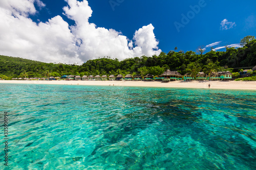 Lalomanu beach with open huts called fales  south side of Upolu Island  Samoa