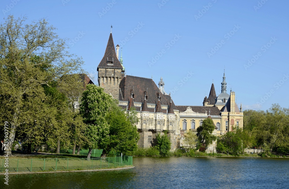 Vajdahunyad Castle in Budapest. The castle is a decoration of Varoshliget park. Vaidahunyad Castle houses the Agricultural Museum. Vajdahunyad Castle in Budapest. The castle is a decoration of Varoshliget park. Vaidahunyad Castle houses the Agricultural Museum.
