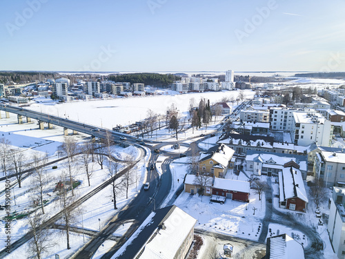 Aerial view of Joensuu, Pielisjoki river in sunny winter day.