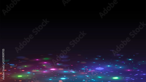 Luminous neon drops of paint on a dark floor, ink glowing in ultraviolet