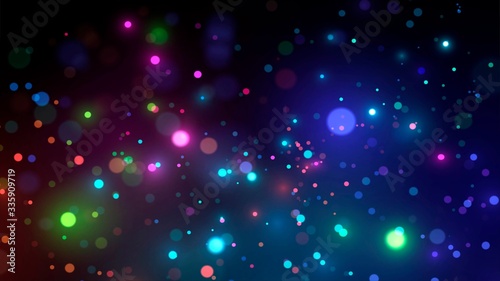 Glowing neon drops of paint on a dark background or blurry colorful sparks