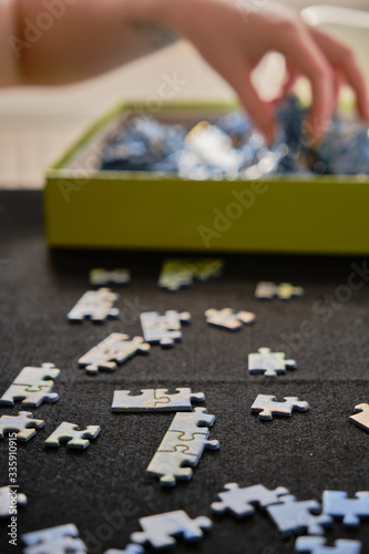 woman puzzles at home