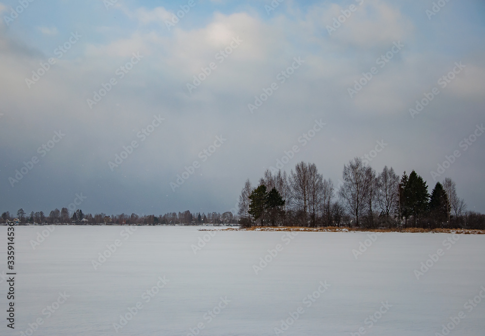 Beautiful winter landscape with ice river