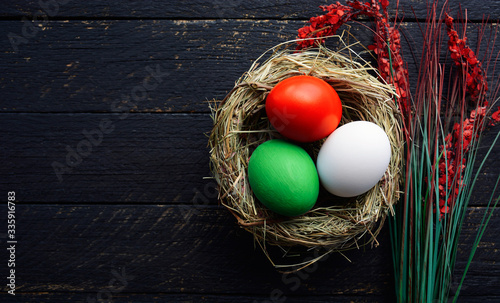 Photography Happy Easter holiday card, Easter eggs as the color of the Italian flag,