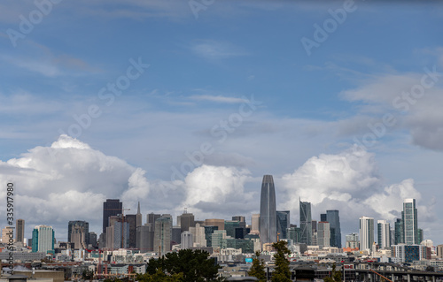 Skyline of buildings with clouds in background