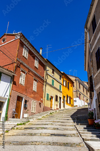 Beautiful steep Borgo Cascine or Via Giacomo Casanova, G. Casanova Street view outside the old city wall in Castelfidardo, Ancona Province, Marche Region, Italy photo