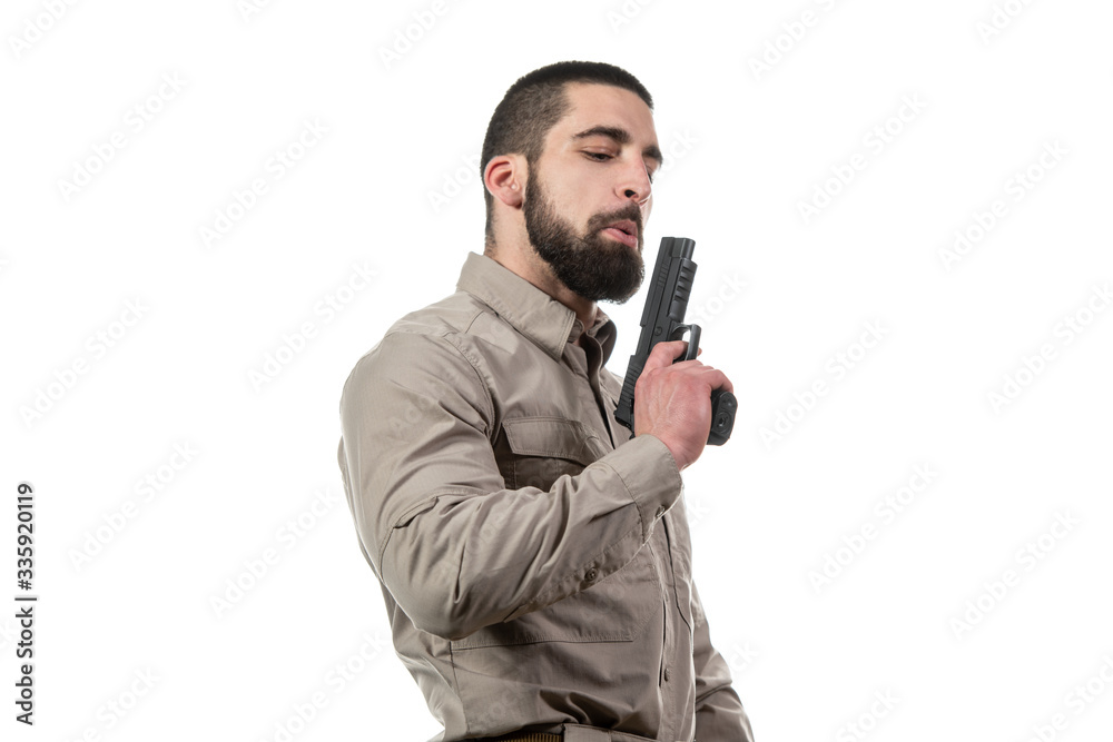 Military Man Holding Gun Isolated on White Background Military Man Holding Gun Isolated on White Background