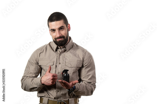 Man Showing Thumbs Up and Holding a Bomb