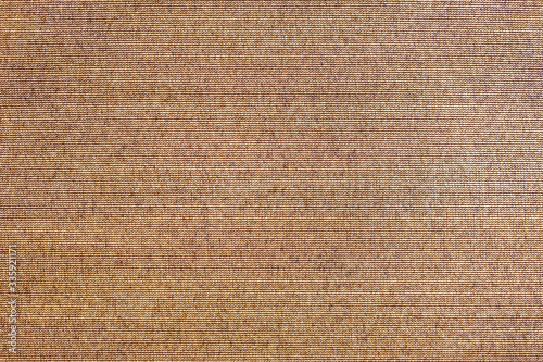 Abstract brown texture background. Surface of rough sack cloth canvas as backdrop for design.