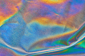 iridescent fabric background, blue-orange-red shiny