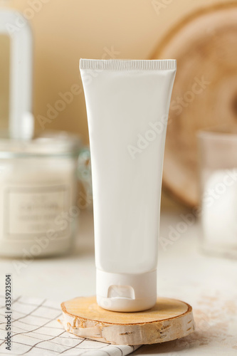  Empty white cosmetic tube of cream or gel. Ready for your packaging design. Spa concept, skin care.