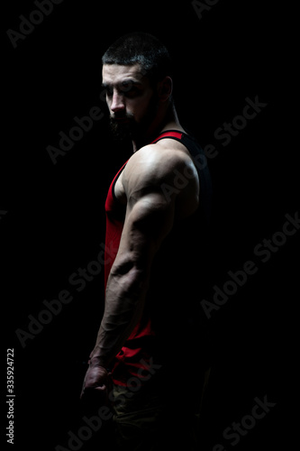 Portrait of a Bodybuilder Isolate on Black Blackground