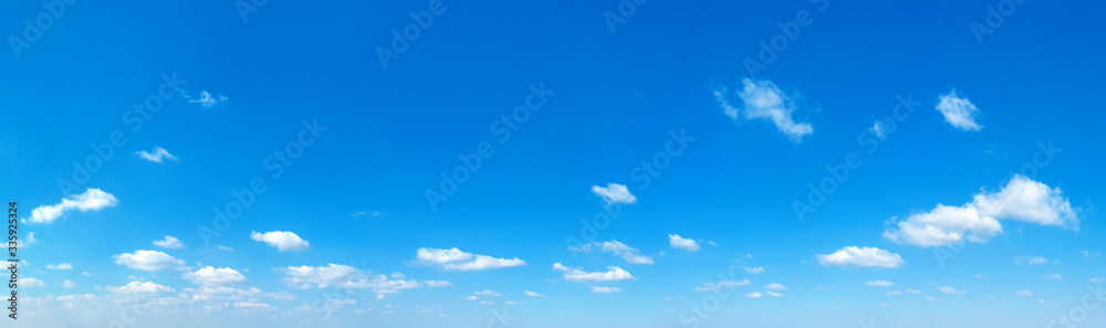 Blue Sky background with tiny Clouds. Panorama background Blue Sky background with tiny Clouds. Panorama background