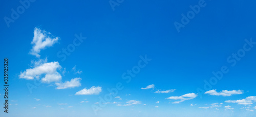 Fototapeta Naklejka Na Ścianę i Meble -  Blue sky background. Natural background. Panorama sky with tiny clouds