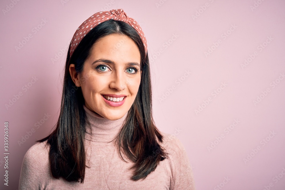 Young brunette woman with blue eyes wearing casual t-shirt and diadem with a happy and cool smile on face. Lucky person. Young brunette woman with blue eyes wearing casual t-shirt and diadem with a happy and cool smile on face. Lucky person.