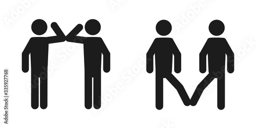 Elbow bump and foot tap icon. New greeting to avoid the spread of coronavirus. Two friends meet, instead of greeting with a hug or handshake, they bump elbows instead or touch their feet together