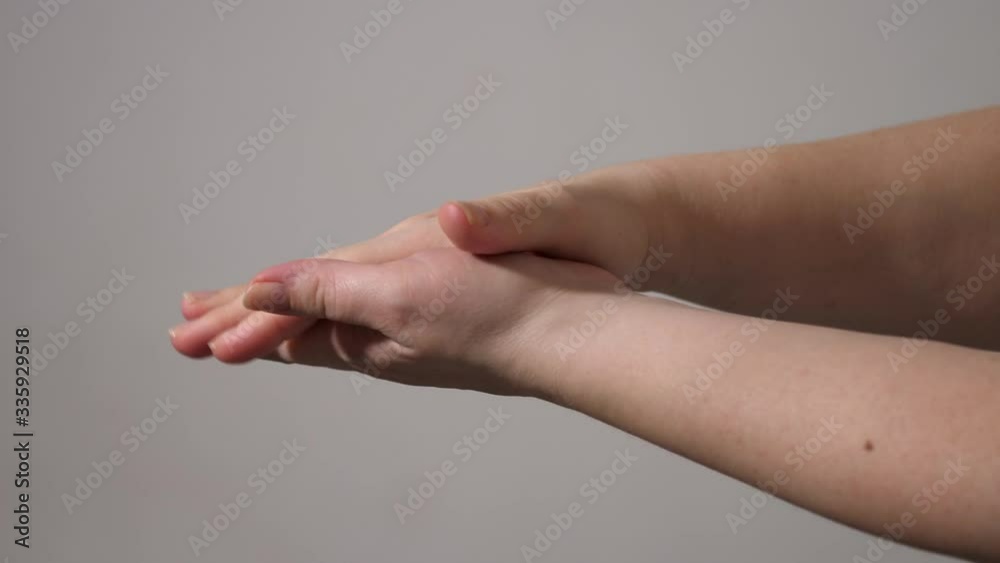 Hands are treated by a sanitizer Hands are treated by a sanitizer