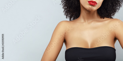 African American woman neckline portrait. Human body part. Female breast photo