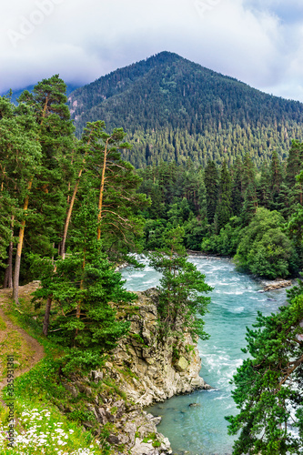 bolshoy zelenchuk river in the caucasus mountains on a summer day photo