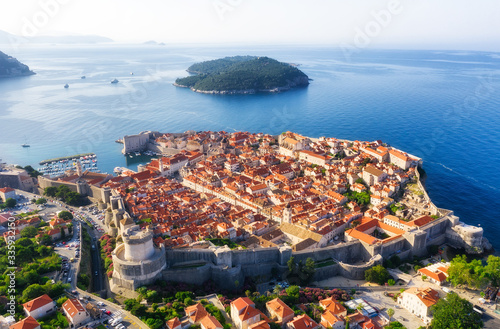 Dudrovnik, Croatia. Aerial view on the old town. Vacation and adventure. Town and sea. Top view from drone at on the old castle and azure sea. Travel - image photo