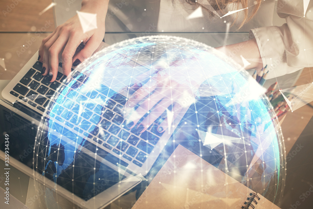 Double exposure of woman hands typing on computer and business theme hologram drawing. Success concept. Double exposure of woman hands typing on computer and business theme hologram drawing. Success concept.