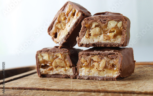 chocolate candy bar with peanuts and nougat