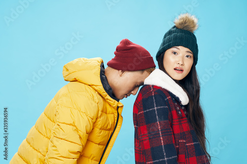 young couple in winter clothes