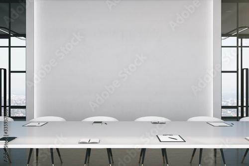 Conference office room with blank abstract wall © Who is Danny