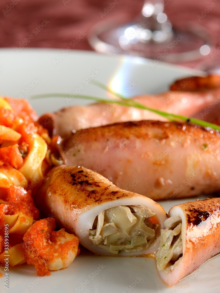 Squid stuffed with fresh champignon and fettuccini with shrimp sauce Squid stuffed with fresh champignon and fettuccini with shrimp sauce
