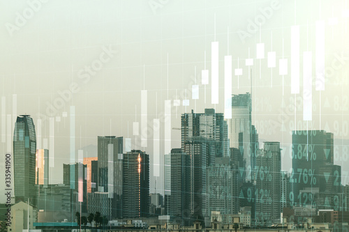 Abstract virtual financial graph hologram on Los Angeles cityscape background, financial and trading concept. Multiexposure © Pixels Hunter