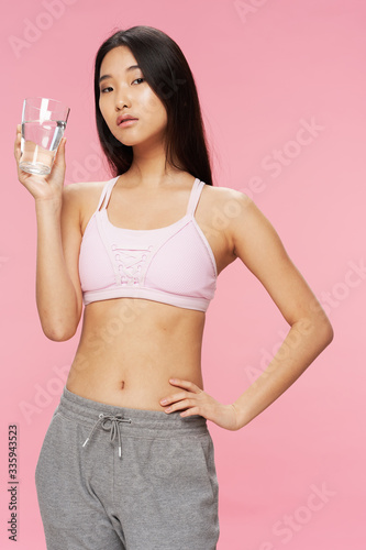 young woman with bottle of water © SHOTPRIME STUDIO