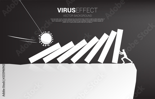 silhouette of businessman falling down by domino effect from corona virus to drop from valley. Concept for economic crisis from virus outbreak.